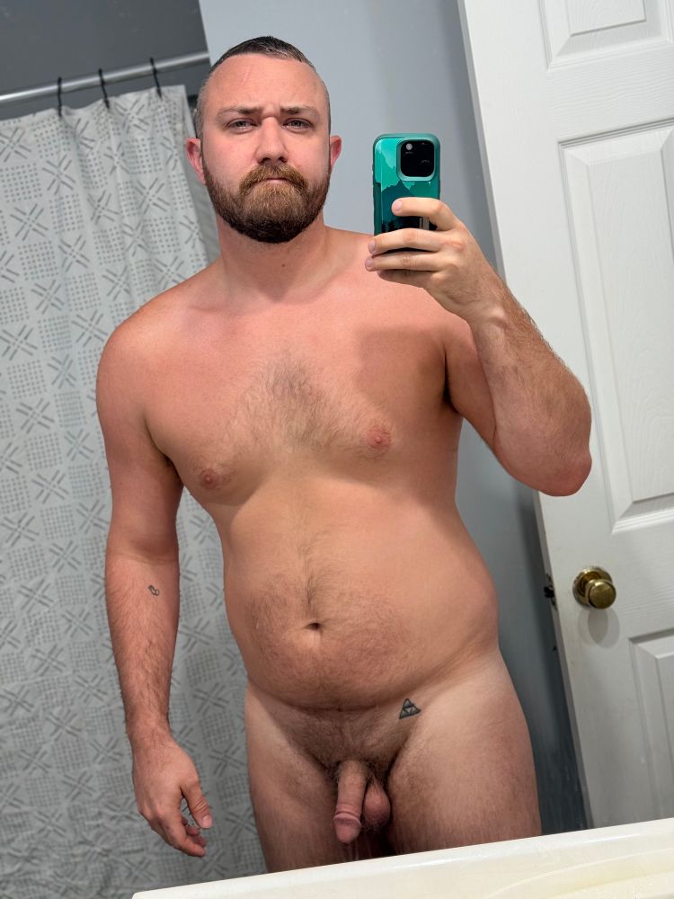 naked man in mirror selfie