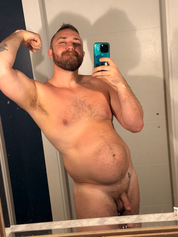 naked man in a mirror selfie