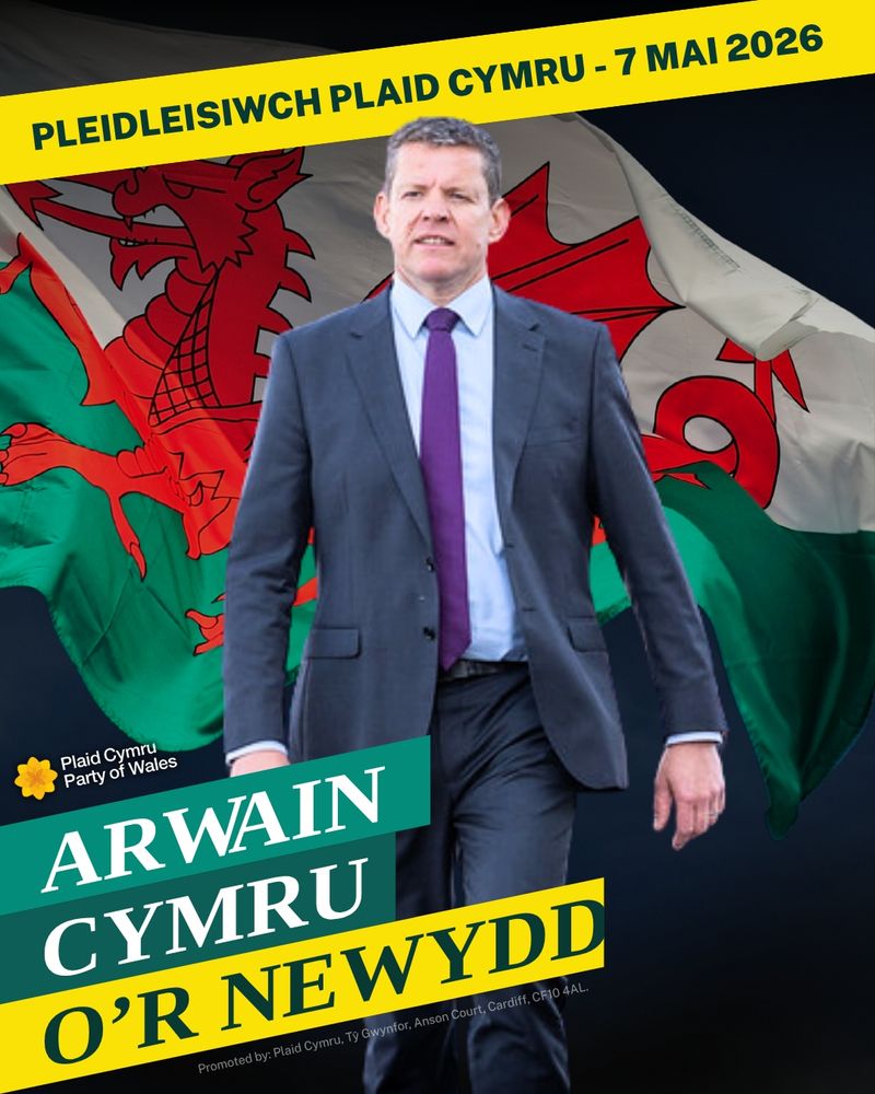 A photo of Rhun ap Iorwerth with the Welsh flag in the background. "New leadership for Wales" at the bottom, and "Vote Plaid Cymru - 7 May 2026" along the top on a yellow banner (all in Welsh.)