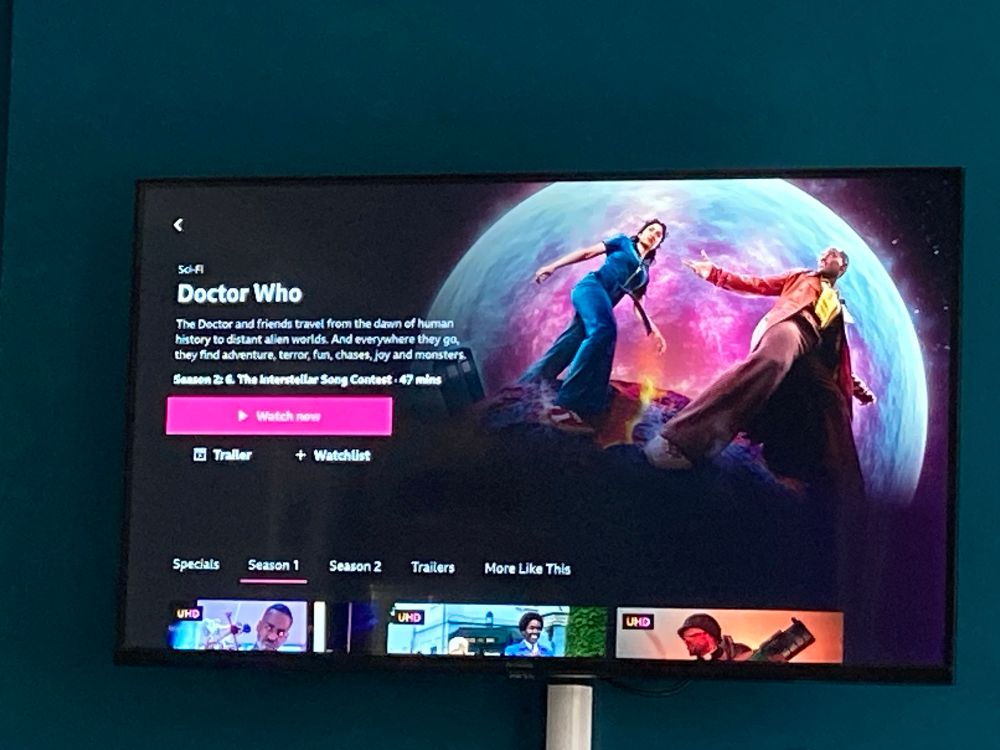 Photo of a television open to the BBC iPlayer page for Doctor Who, with the next episode listed as “The Interstellar Song Contest”.