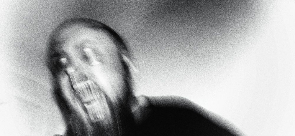 Black and white picture of me. My eyes are white and my teeth can be seen.