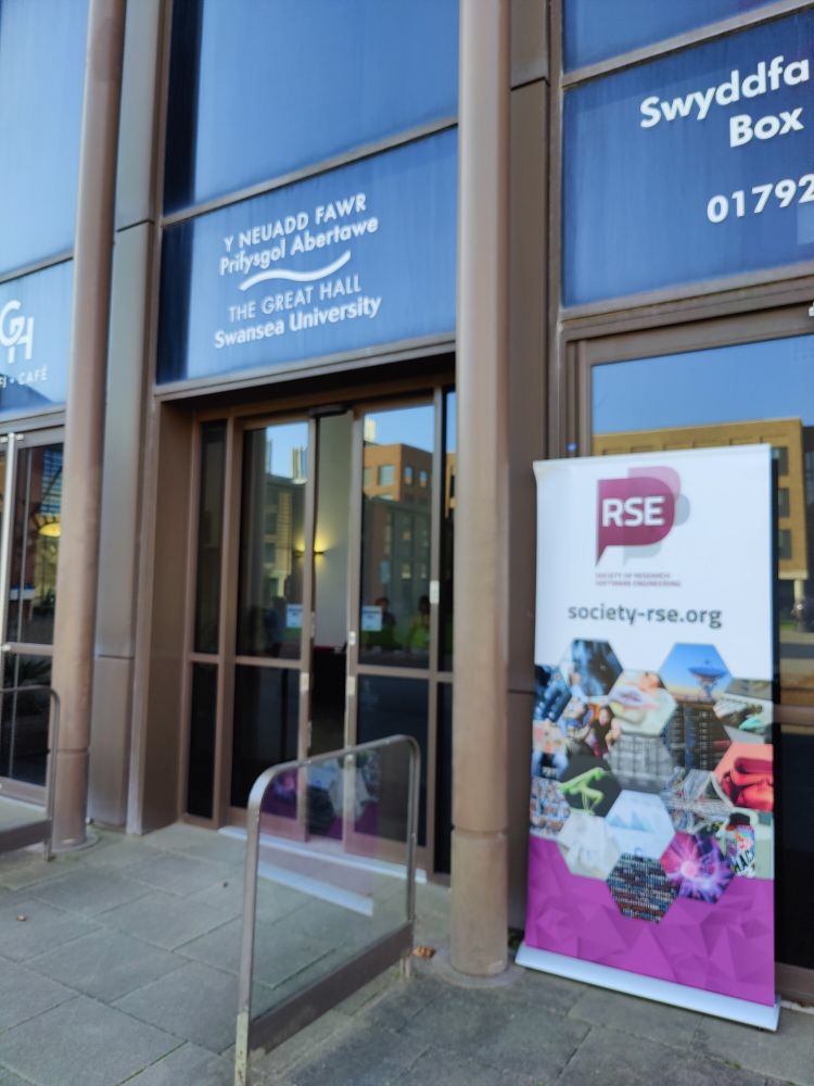 The RSE Society banner outside the Great Hall, Swansea University