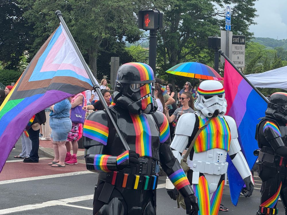 Star Wars characters in rainbow attire. 