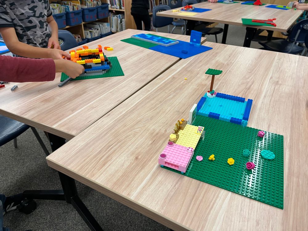 More of…

Some LEGO platforms on tables in various states of building representations of three or more landforms (mountains, rivers, plateaus, deserts…etc, etc) to eventually be mounted on our library LEGOwall display.

This is an enhancement activity to approach their Social Studies curriculum content in an engaging way.
