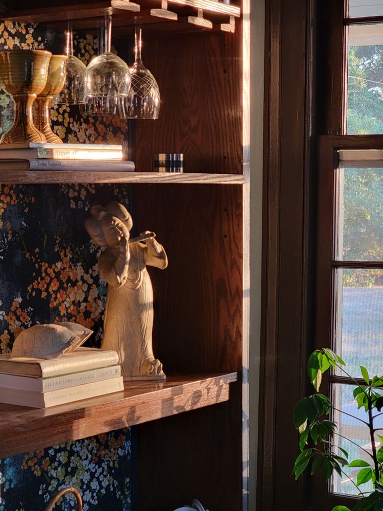 Sunlight shining on the bookshelf. 