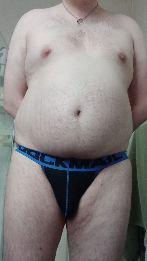 Obese feedee in a jock stood up