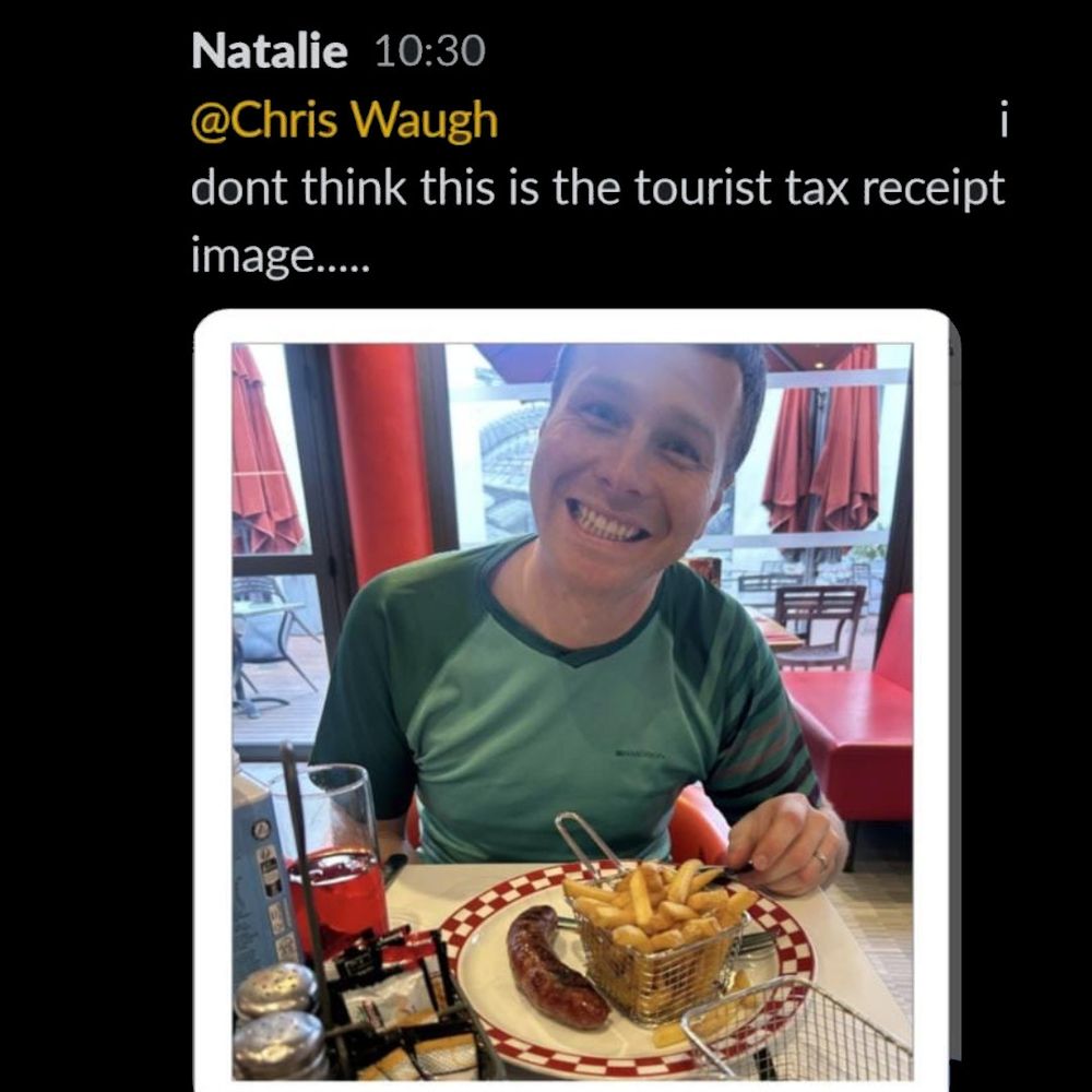 A picture of a hobbit eating a sausage