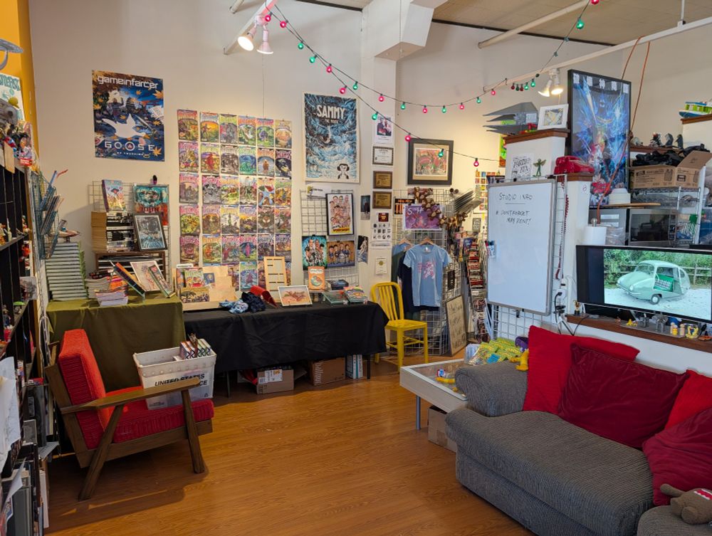A wide shot of the interior of World Monster HQ, a local Twin Cities cartoonists studio. 