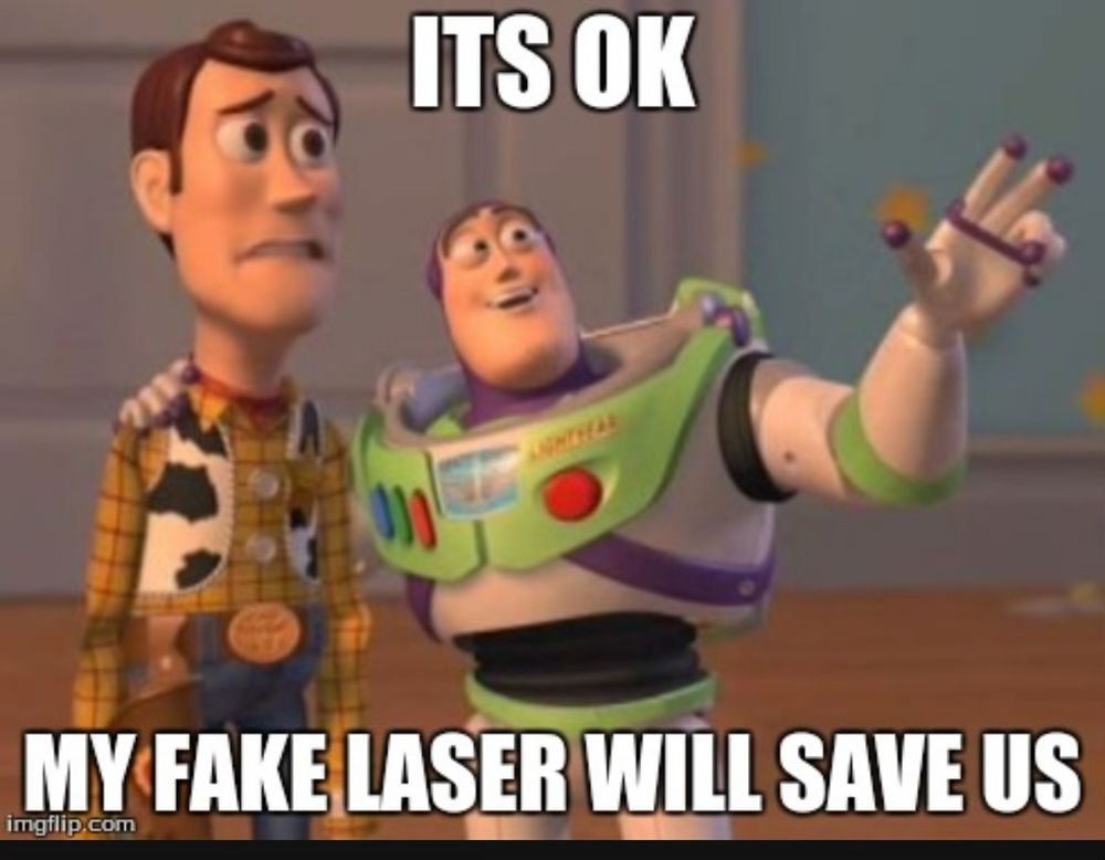 Scene from Toy Story with woody and buzz lightyear saying, “it’s okay, my fake laser will save us”