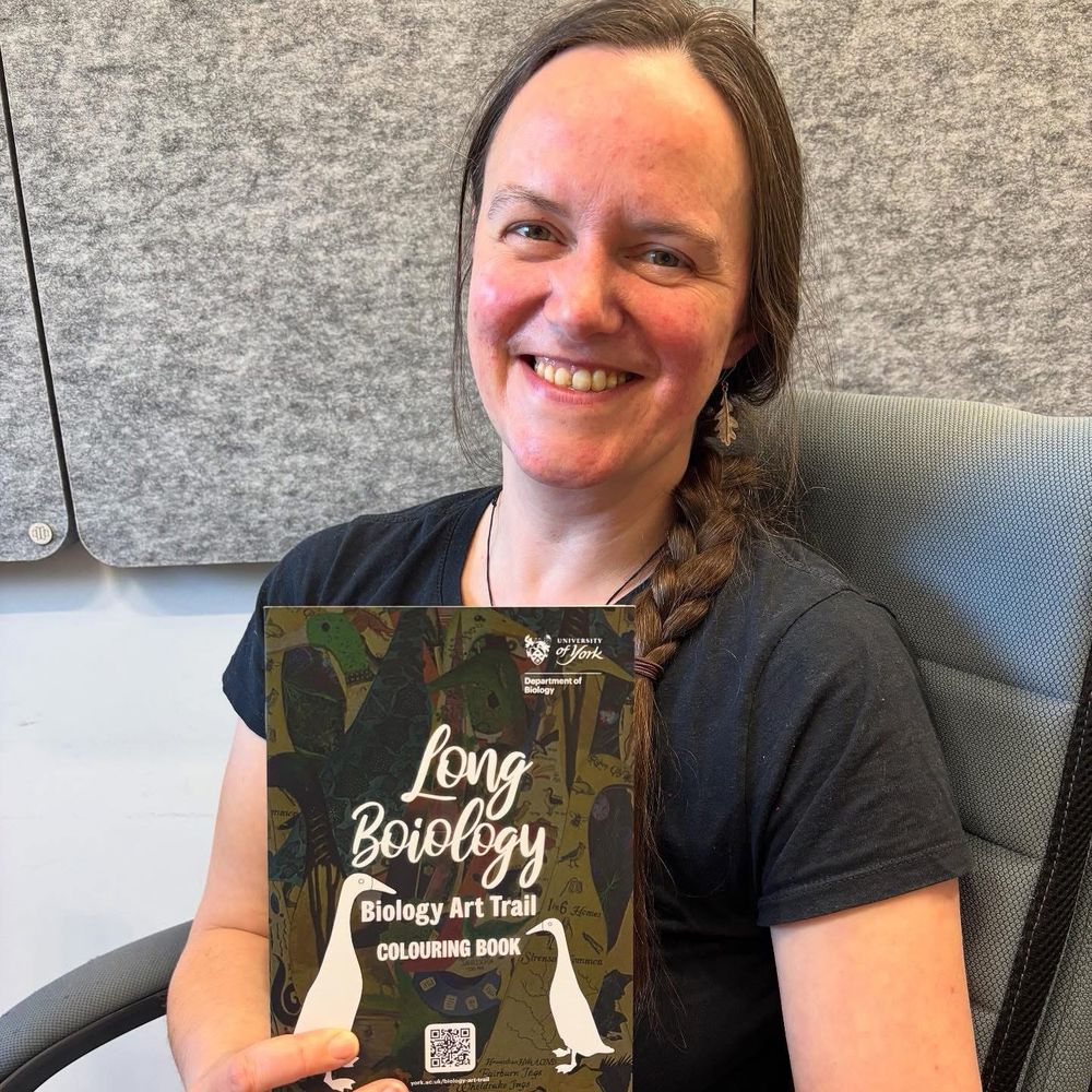 Prof Pen posing with the colouring book of our LongBoiology art trail project 