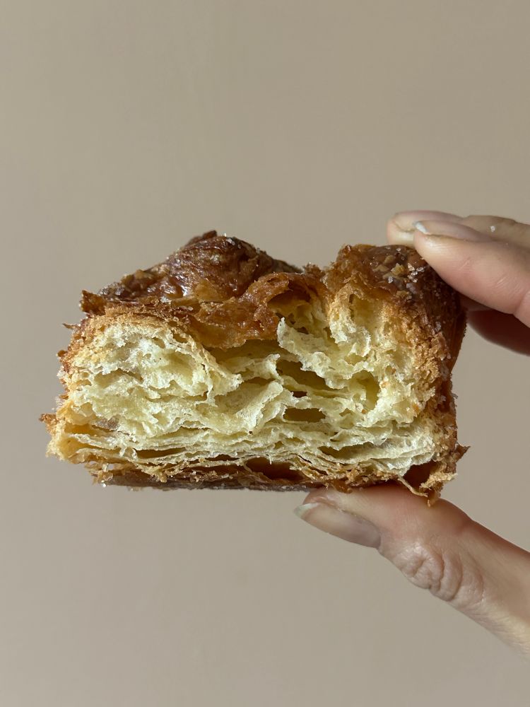 pillowy kouign amann layers seen cut in half