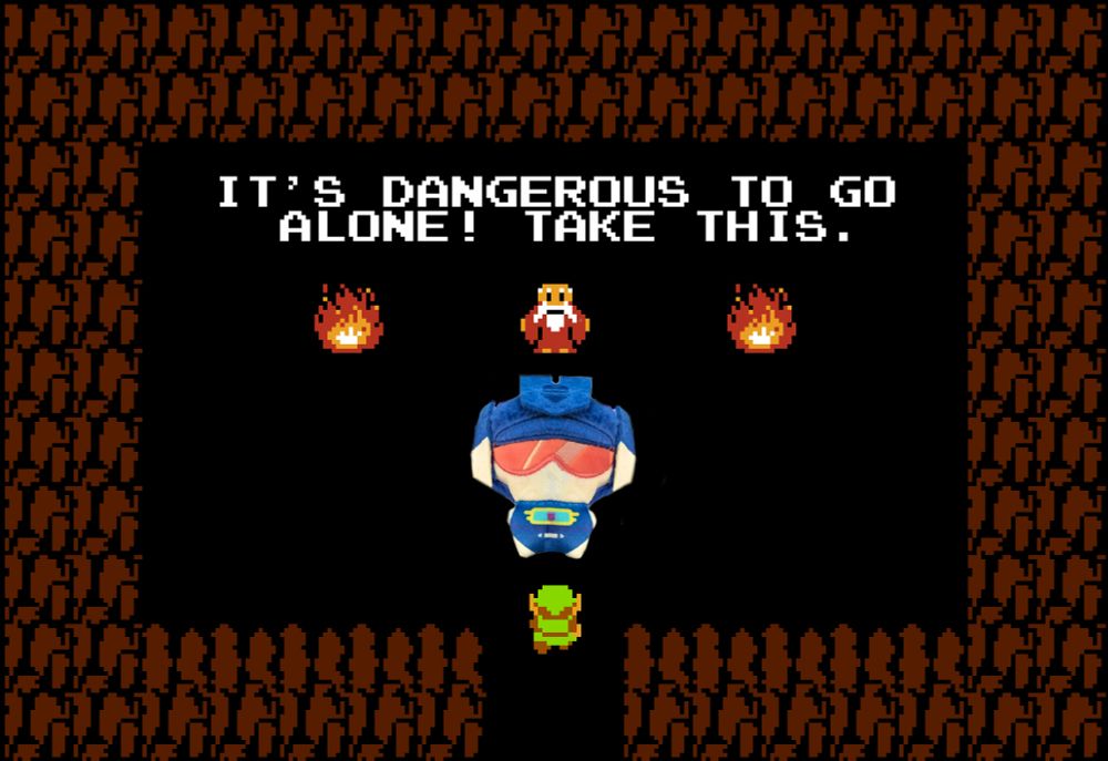 The Legend of Zelda meme, "its dangerous to go alone, take this" but the sword has been replace with a felt chibi transformer