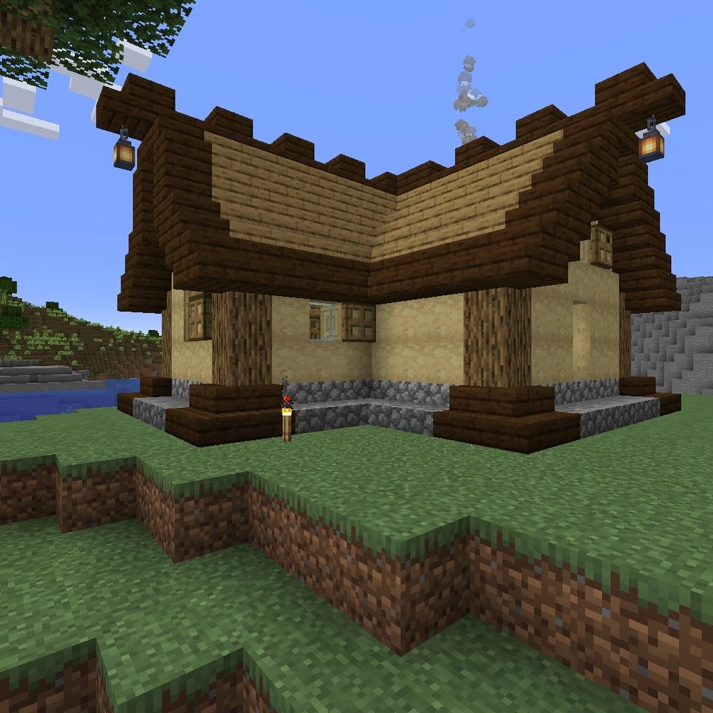 The same small house in Minecraft, from another angle, the oak tree can be glimpsed in the upper left corner