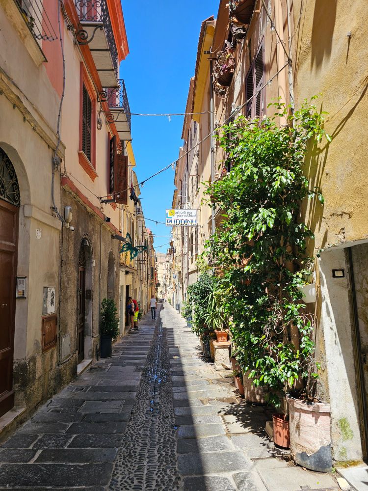 Lobg narrow alley in the old town of Sassari 