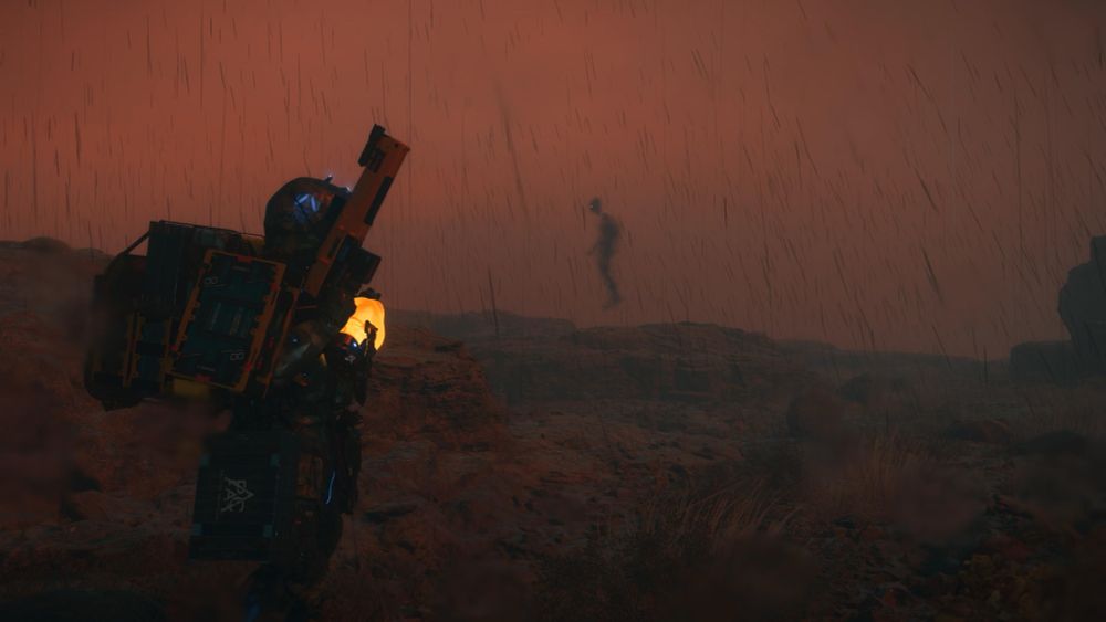 Sam Porter Bridges of DRAWBRIDGE, armed with an Assault Rifle, readies himself as a BT looms in the distance 