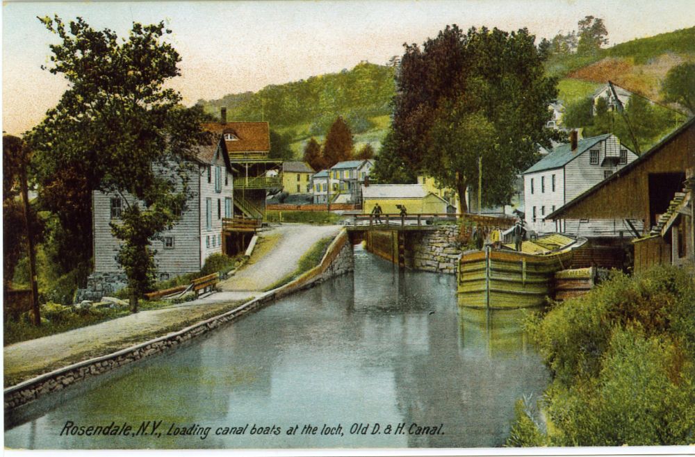 Painting of the Rosendale Canal landings.  A boat is loading at a canal side dock.