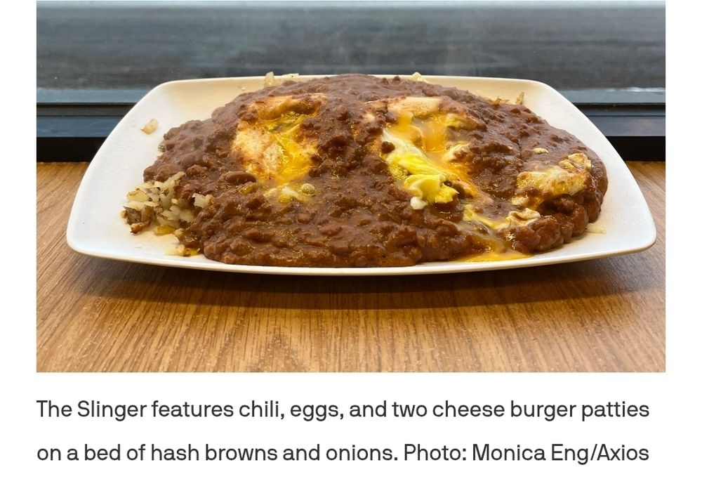 Picture of the Slinger and a description of its contents that includes chili eggs two cheeseburger Patties on a bed of hash browns and onions.