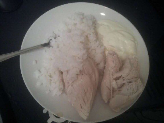 very bland looking pale meal boiled chicken rice and mayo