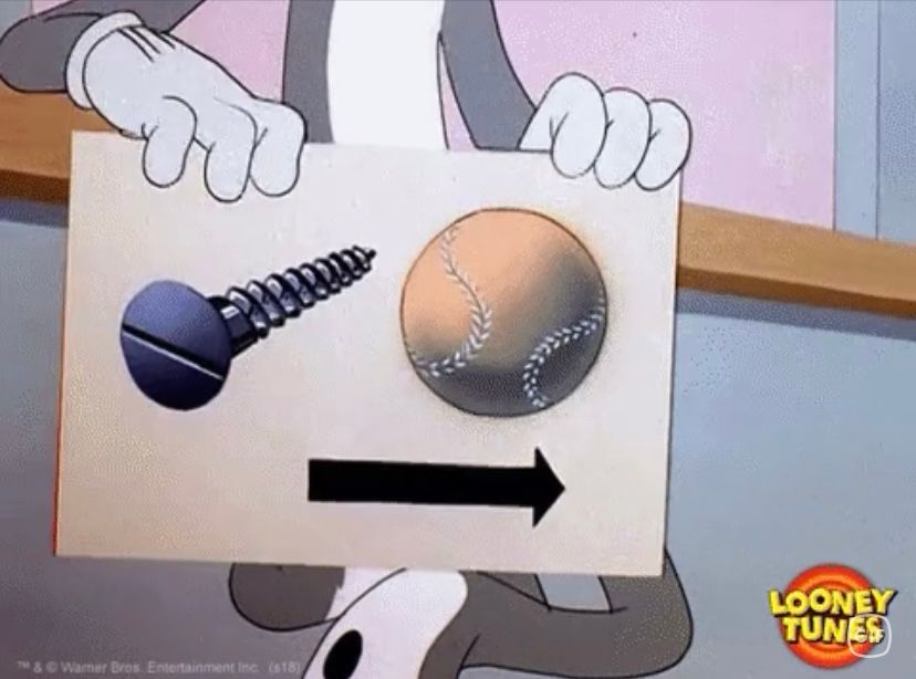 Bugs Bunny holding screw+ball sign