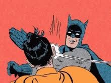 Batman abofeteando a Robin