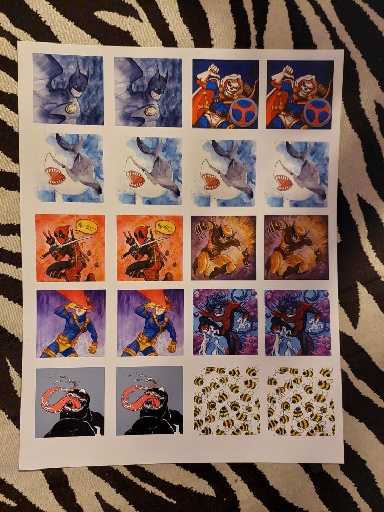 A sheet of various designs in sets of two, ready to be trimmed to their appropriate sizes and shapes. 