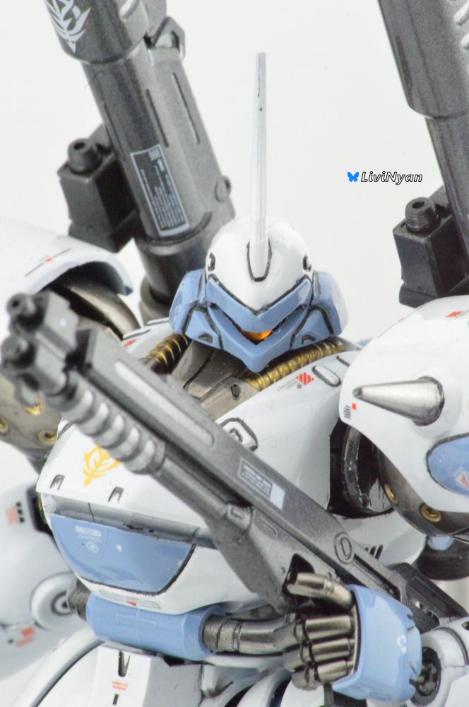 a  macro headshot of a fully painted HG Kampfer, painted in primarily white and blue