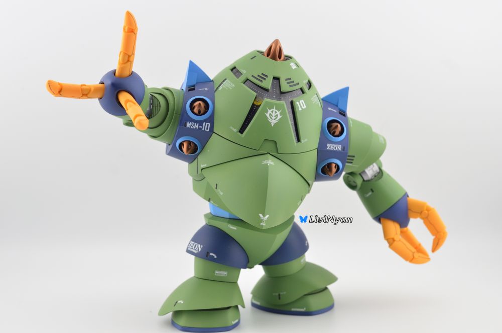 A Front on picture of a model kit of the MSM-10 Zock, painted in dark blue and green