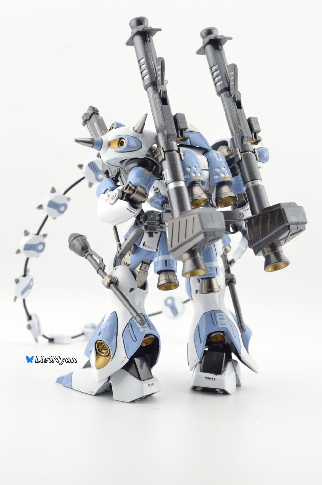 a rear Picture of the MS-18E kampfer painted in a high gloss white and pale blue with Metallic gold and gunmetal accents