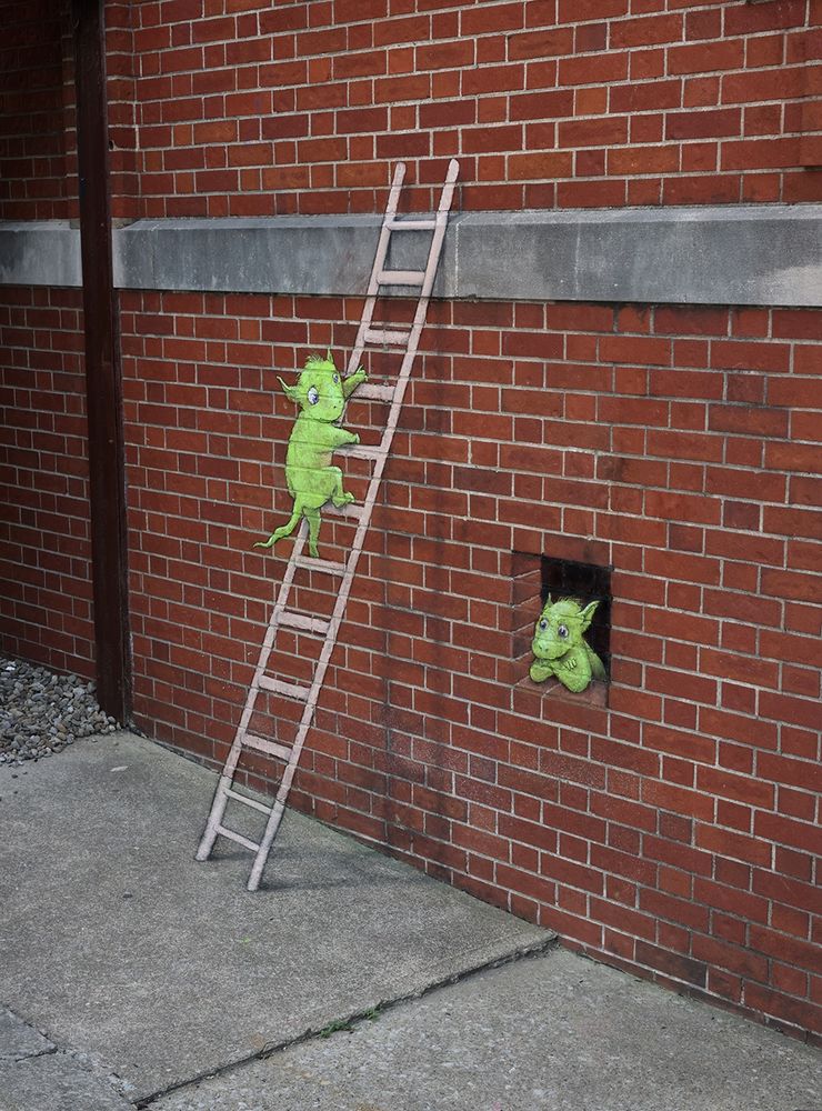 sidewalk chalk drawing of a small green monster climbing a ladder next to window where another green monster is sitting disconsolately