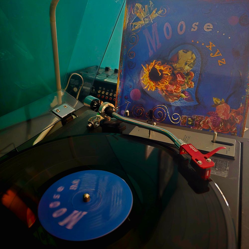 Album cover for the lp "...xyz" by the band Moose. The album is spinning on a vintage Sansui turntable with an Ortofon Red cartridge. 