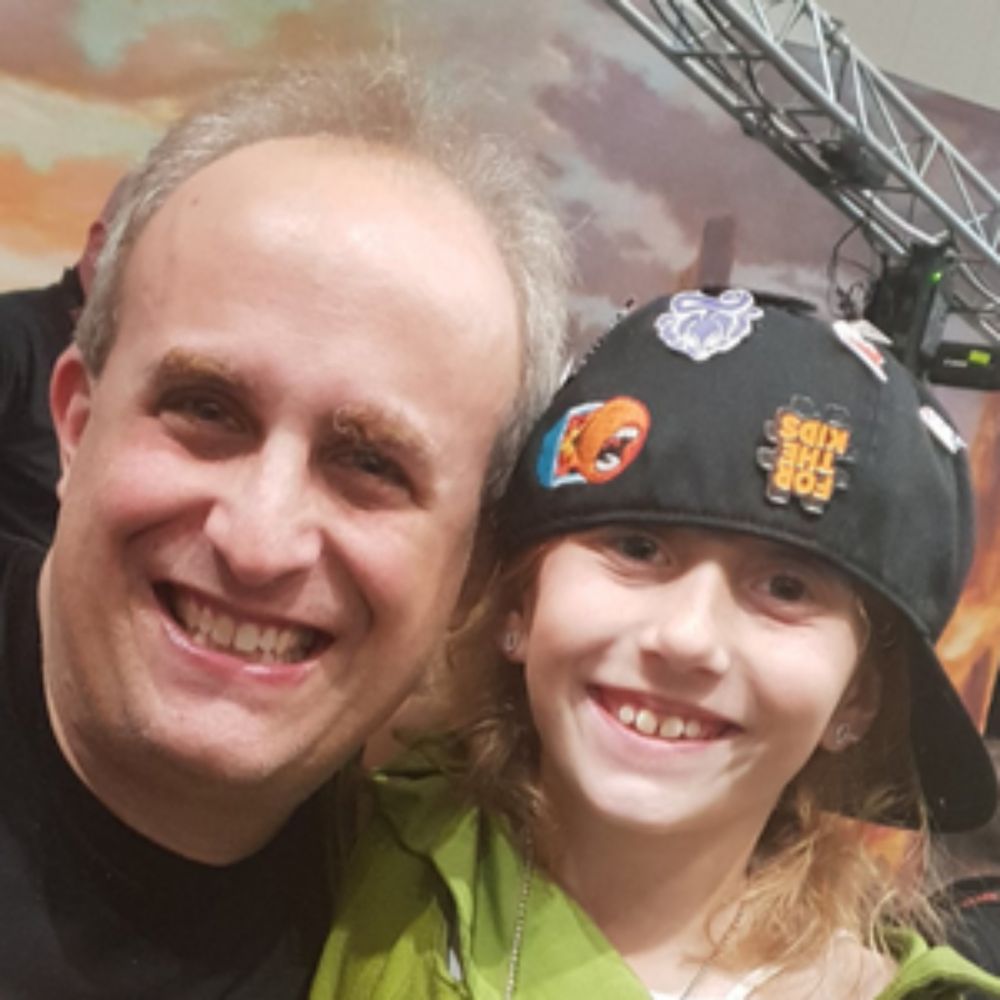 We are a father and daughter who love playing Magic: the Gathering.  Dana is the youngest person to earn a cash prize at a Grand Prix and is a commentator, cosplayer, and player of many formats.  Adam...