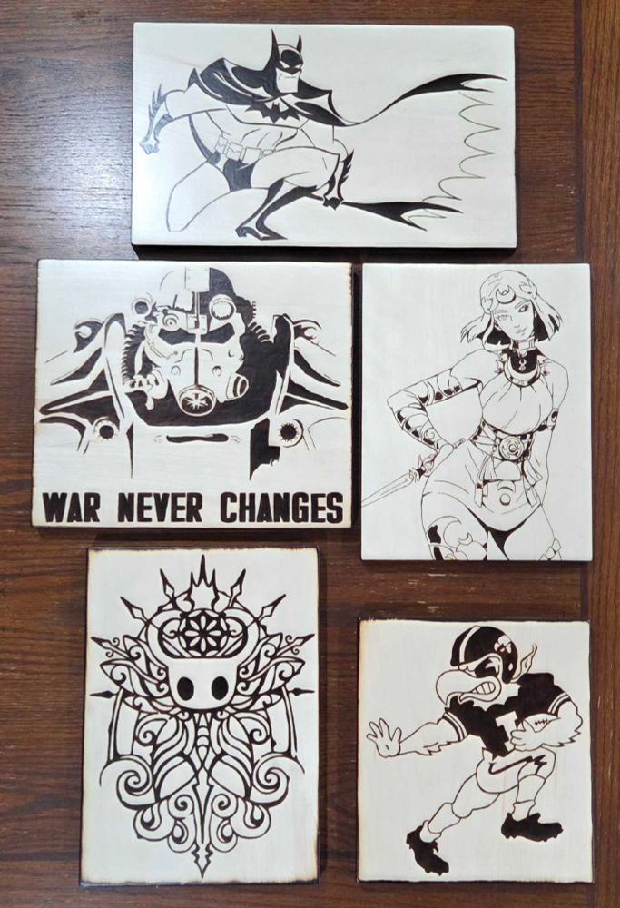 The 5 woodburnings I'm raffling off at 10 pm tonight: Batman, Fallout, Hades 2 (Melinoe), Hollow Knight, and the Retro/Heisman Herky!