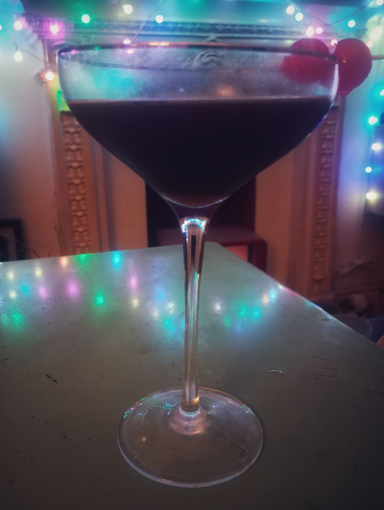 A Revolver !
2 x Whisky 
1 x Kahlúa 
2 dashes of bitters 
Ice
Shake it like you're Van Heflin standing up to Jack Palance 
🍸