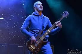 P-Nut of the band 311 plays a bass guitar with an extra string