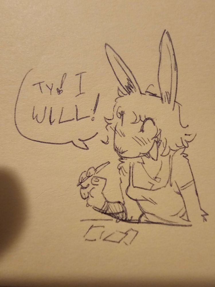 A blushing bunny girl, says thank you while sitting at a table covered in post it notes 