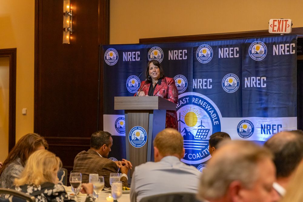 Lieutenant Governor Driscoll standing at a podium 