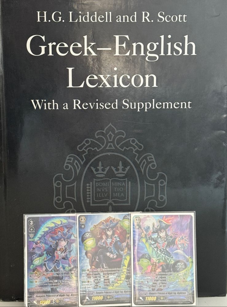 3 Nightrose SPs, 1 GBT08, 1 GCB03, and 1 VBT09 resting in front of a copy of Liddel and Scott's Greek Dictionary