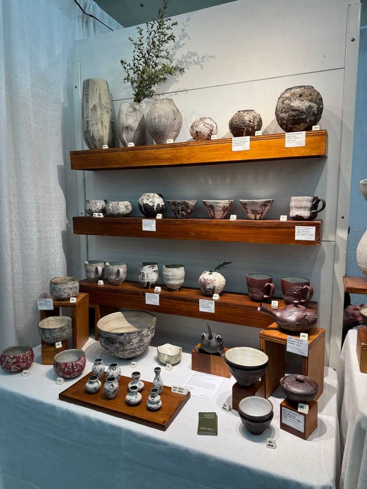 A shelf filled with heavily textured pots waiting for their forever homes! They are all earthy and have Scandinavian/Japanese shapes with Icelandic-Inspired surfaces. 