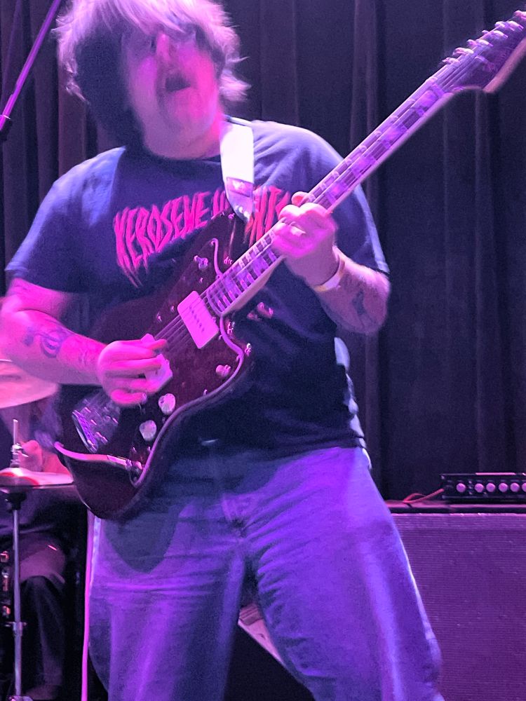 elephant jake guitarist wearing a kerosene heights shirt