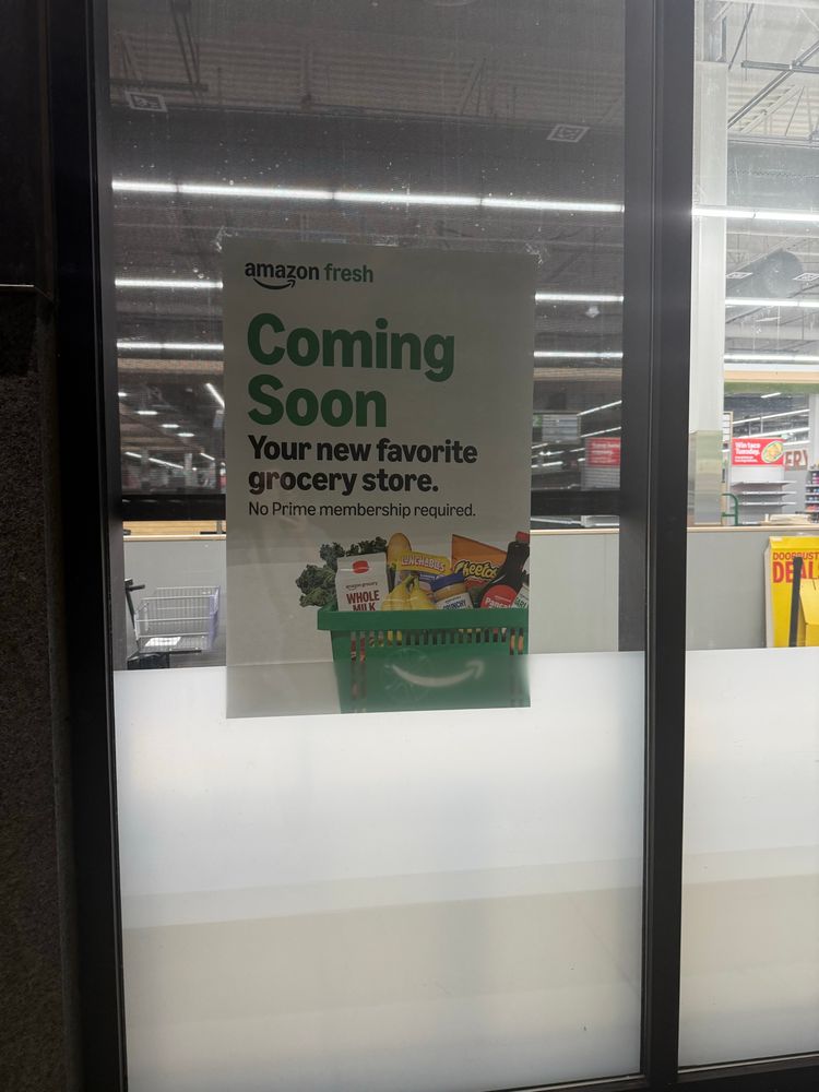 Amazon Fresh “coming soon” sign on the front window of The Carson’s largest retail space at 6th and Spring Garden. 