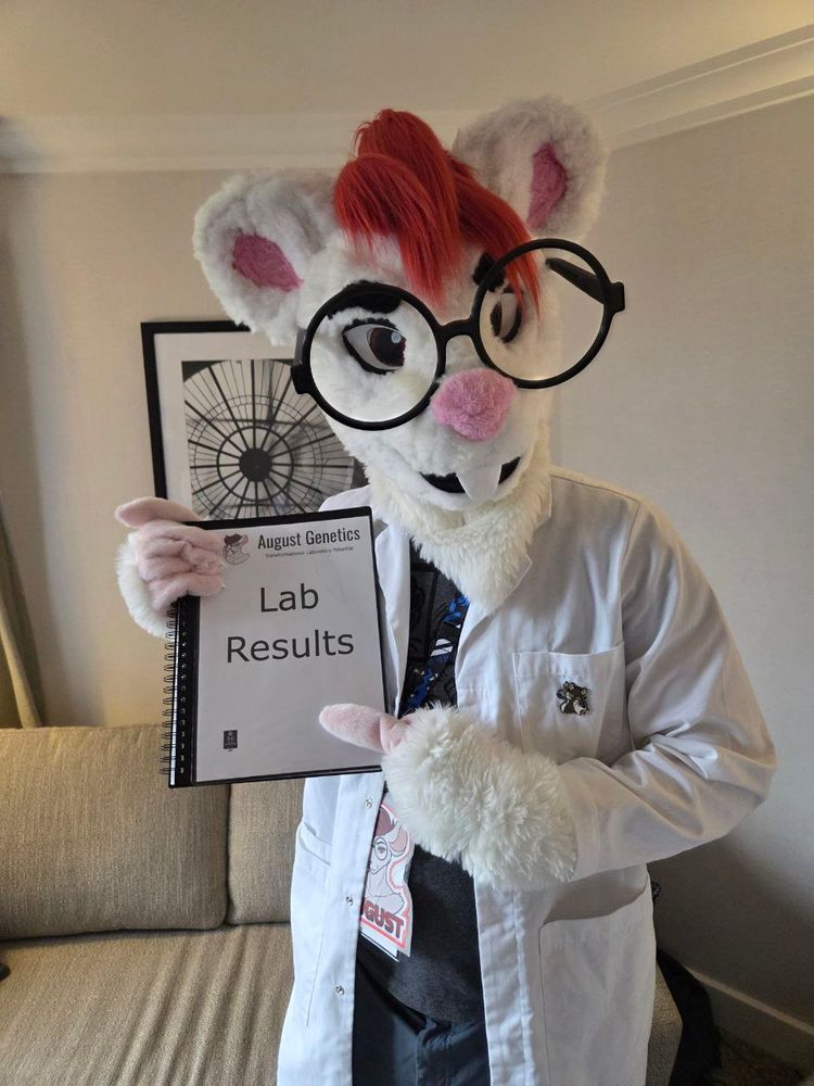 A white rat in a lab coat with a book of lab results