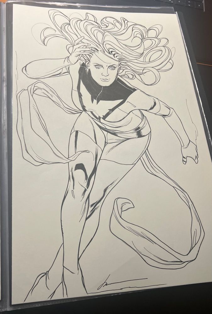 Jean grey from the X-men , Marvel comics . She is flying while in focuse mode 
