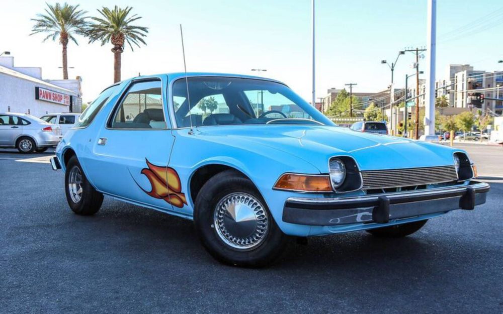 Same model car, AMC Pacer, in blue with tiny flames by the wheels. As seen in Wayne's World.