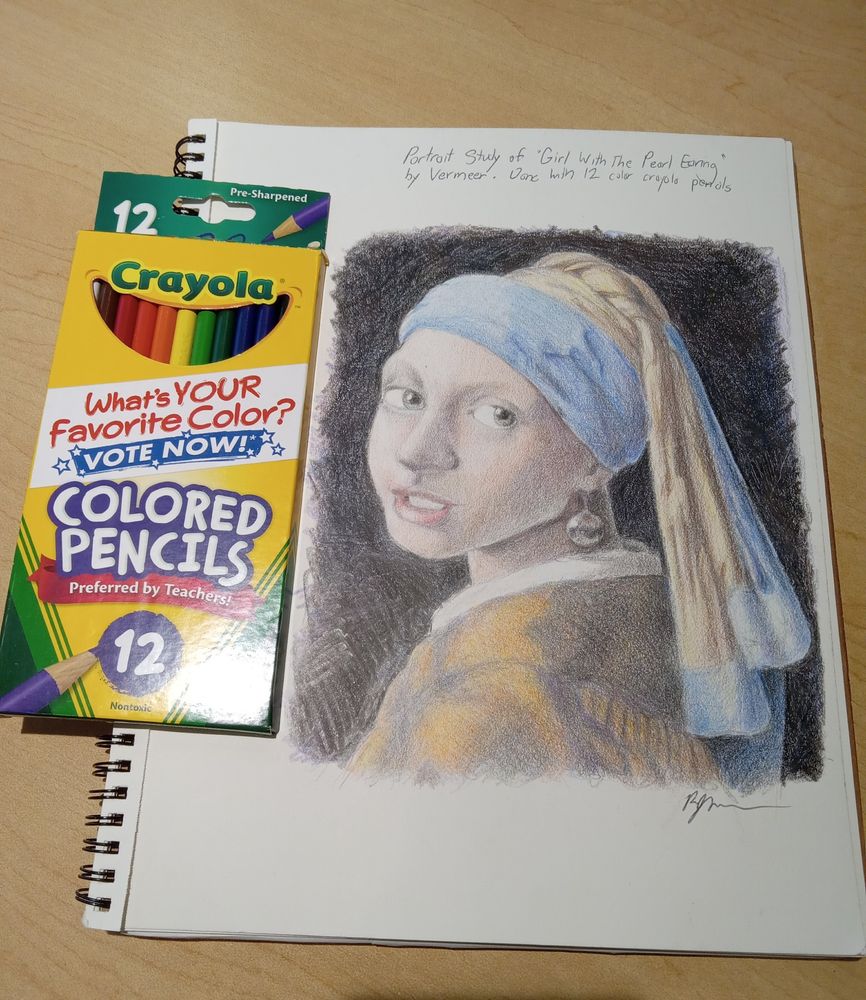 a photo of my portrait study of girl with the pearl earring with the 12 crayola pencils i used to color it with.