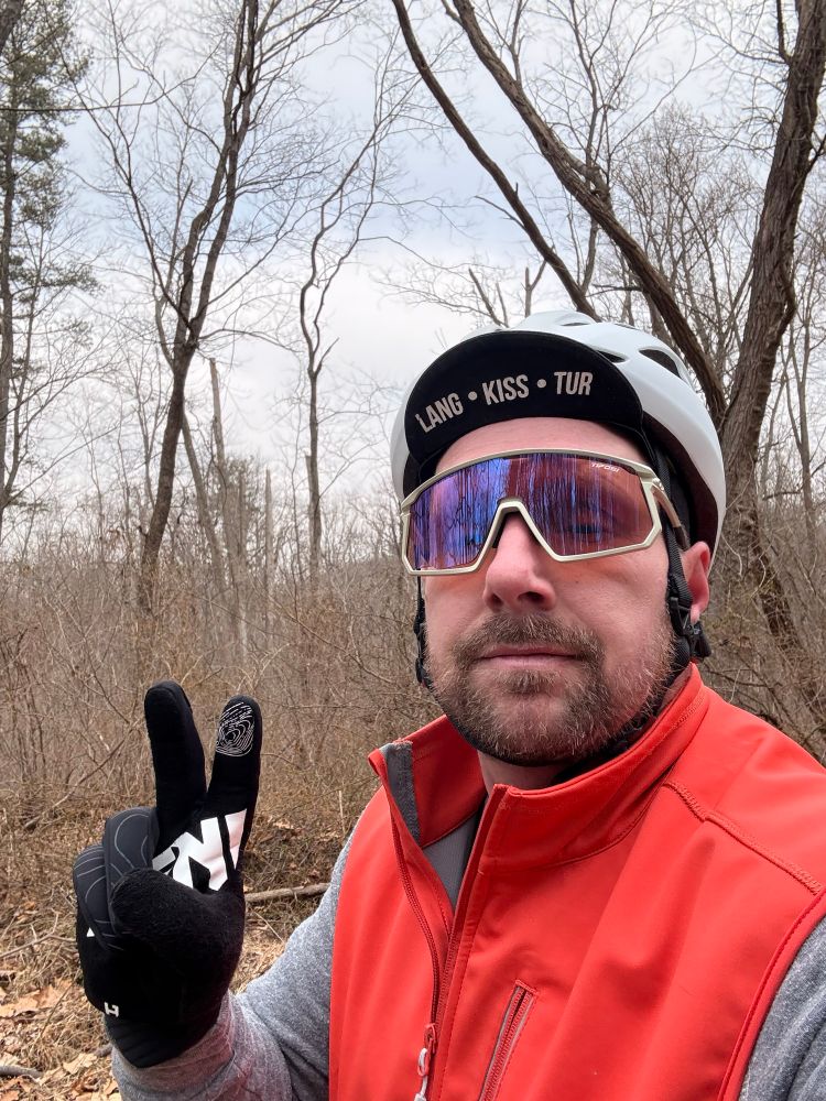 Cyclist on gravel road 