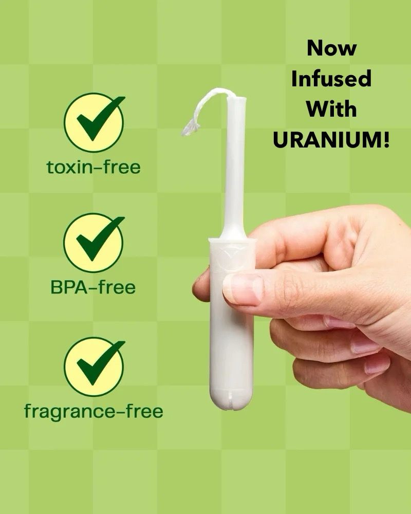 Tampon held in hand with words “Now Infused With Uranium!”