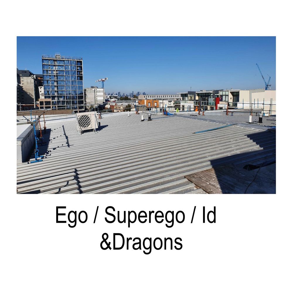 Single cover reading "Ego / Superego / Id &Dragons"
An image is shown within the cover of a rooftop