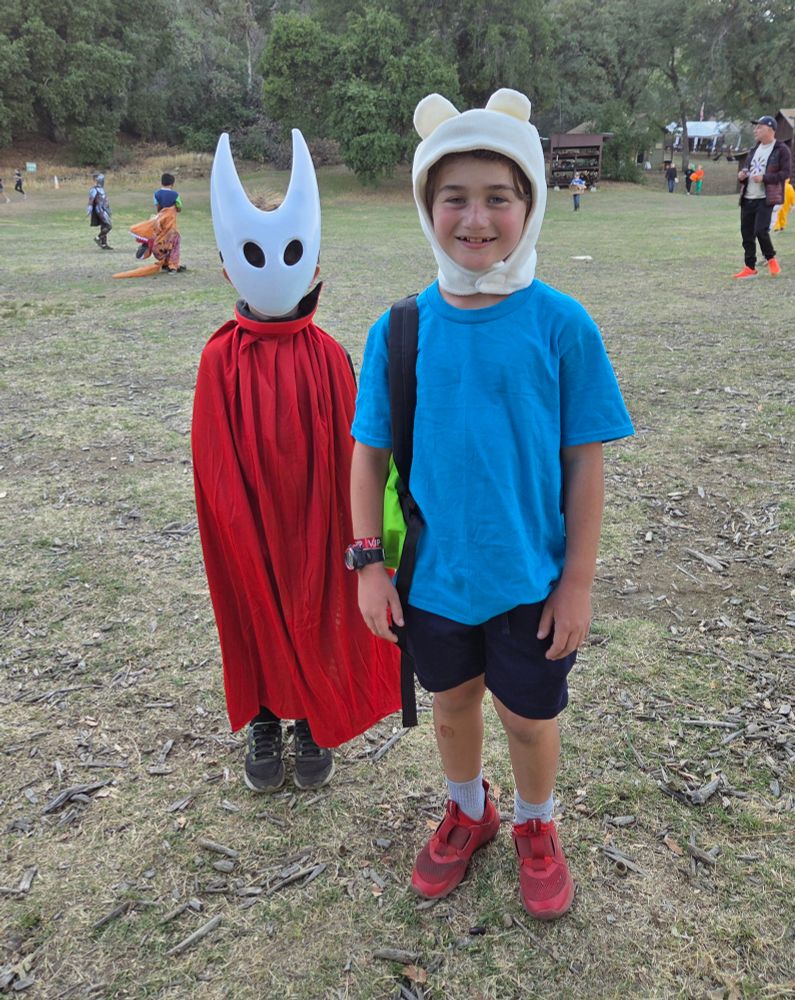 My two kids in their Halloween costumes (Hornet from Hollow Knight: Silksong and Finn the Human from Adventure Time) 