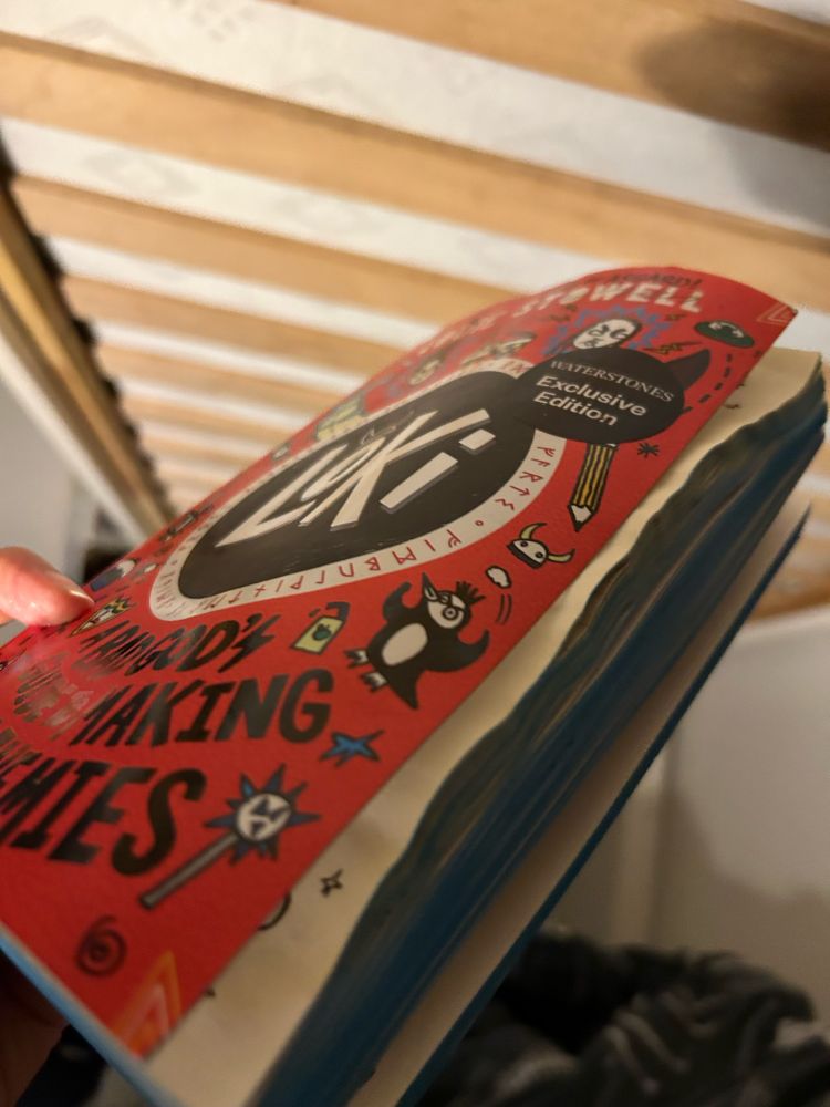 A copy of a children’s book with wet and wrinkled pages 