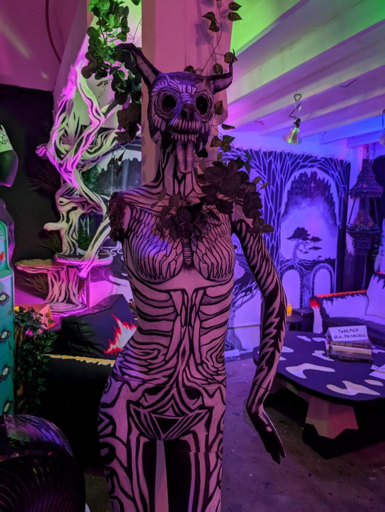 A feminine mannequin with a fox head by Prism Cell.